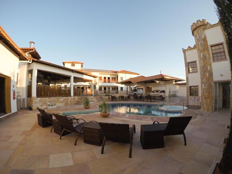 Pousada Vila Americana เบโลโอรีซอนชี ภายนอก รูปภาพ