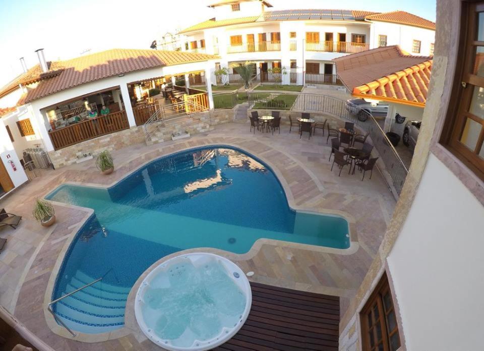 Pousada Vila Americana เบโลโอรีซอนชี ภายนอก รูปภาพ