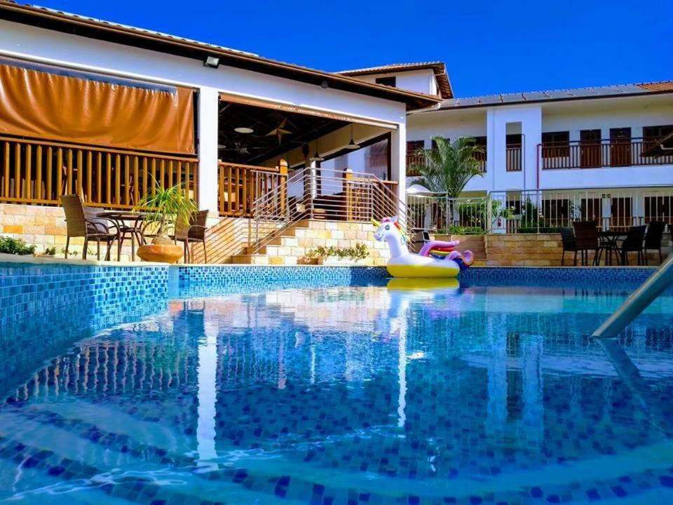 Pousada Vila Americana เบโลโอรีซอนชี ภายนอก รูปภาพ
